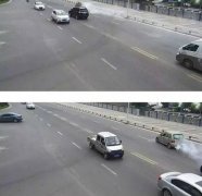 小车尾部冒着烟 还在公路中间行驶