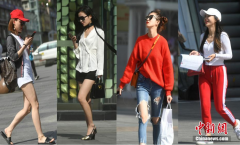 主城气温逼近30℃  山城美女着装清凉出行