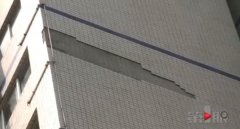 墙砖从天而降 外墙维修为何无法开展